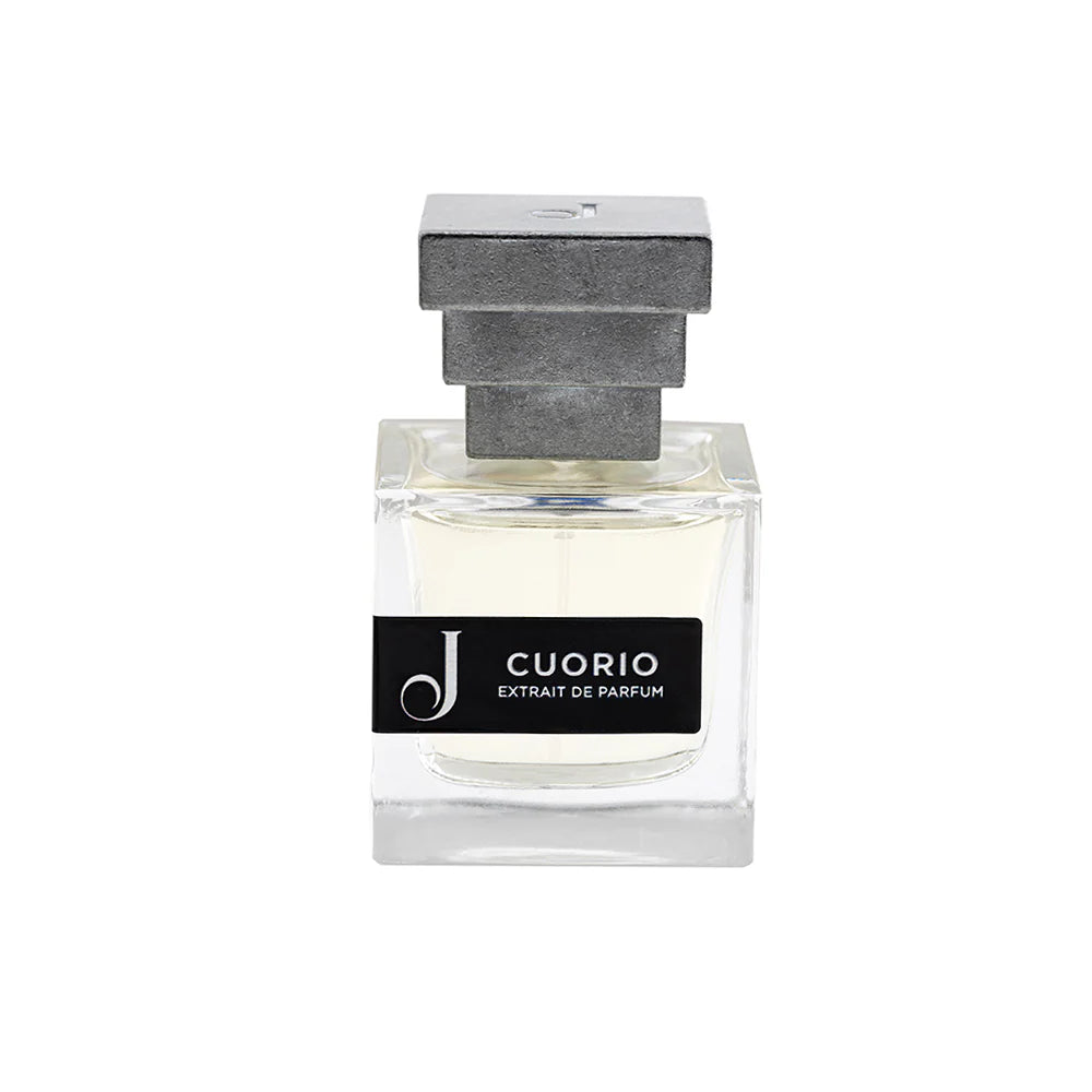 Flacone trasparente di profumo Cuorio Extrait de Parfum con tappo geometrico grigio