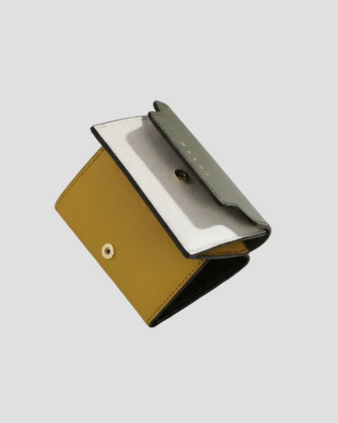 Portafoglio donna in pelle bicolore giallo e verde, design elegante, chiusura a bottone