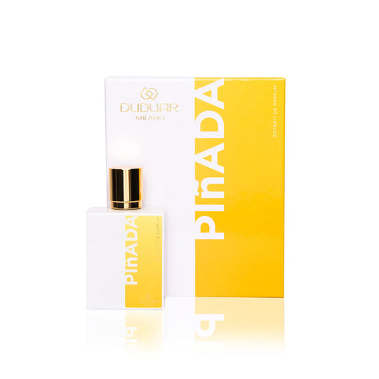 Profumo Duduar Milano Pinada in flacone bianco con dettagli oro e confezione gialla elegante.
